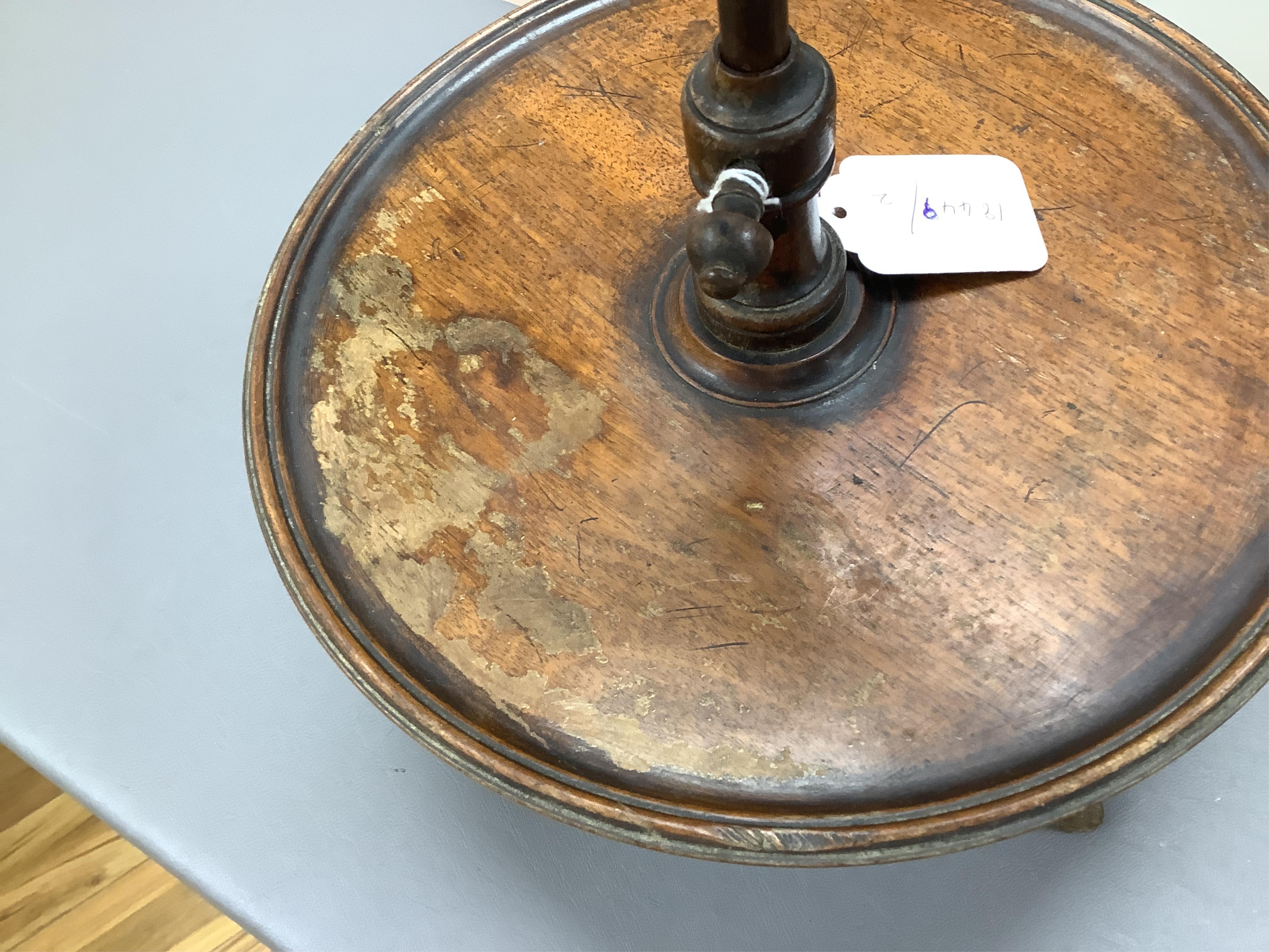 A Victorian mahogany gentleman's shaving mirror on stand with circular shelf, 65cm high.